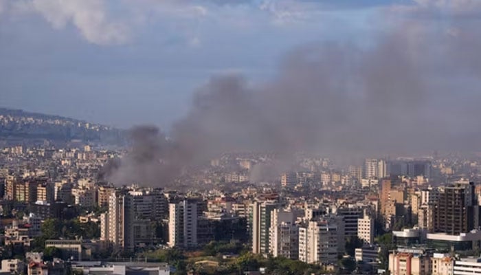 Smoke billows over Beirut, after overnight Israeli air strikes, as seen from Sin El Fil, Lebanon, October 2, 2024.—Reuters