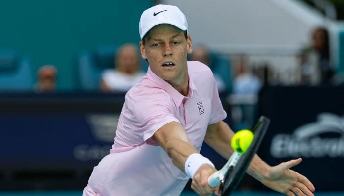 Jannik Sinner of Italy hits a shot against Frances Tiafoe of the United States in the quarter finals of the men’s singles at the Miami Open at Hard Rock Stadium on Mar 26, 2026. — Reuters