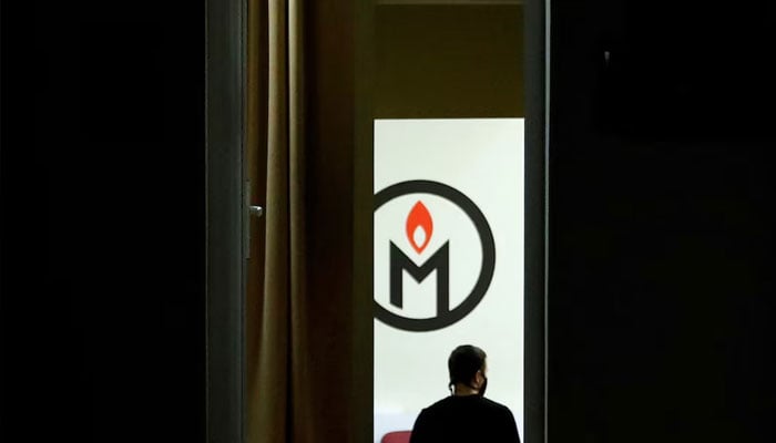 A man walks inside an office of the human rights group Memorial in Moscow, Russia December 29, 2021.—Reuters