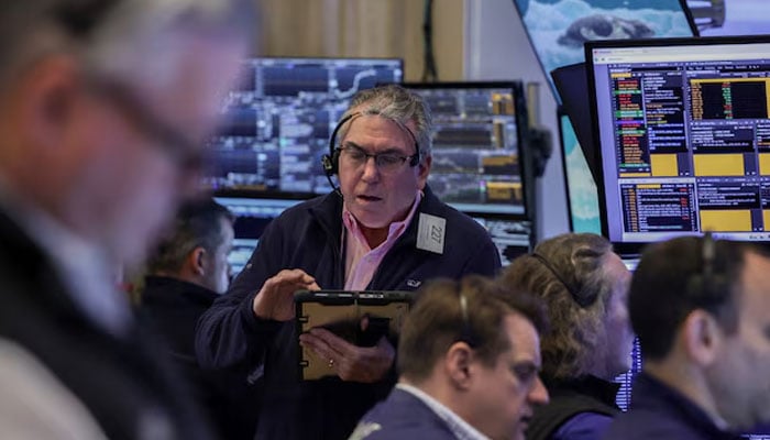 Traders work on the floor at the New York Stock Exchange (NYSE) in New York City, US, April 2, 2026. — Reuters