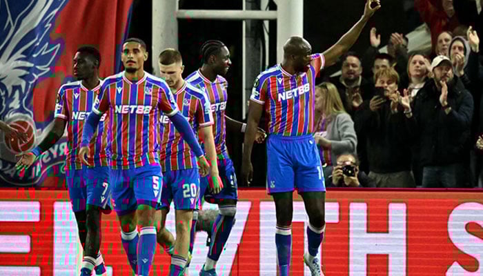 Crystal Palaces French striker Jean-Philippe Mateta (R) celebrates scoring the teams first goal in the UEFA Conference quarter-final, first-leg against Fiorentina. — AFP/File