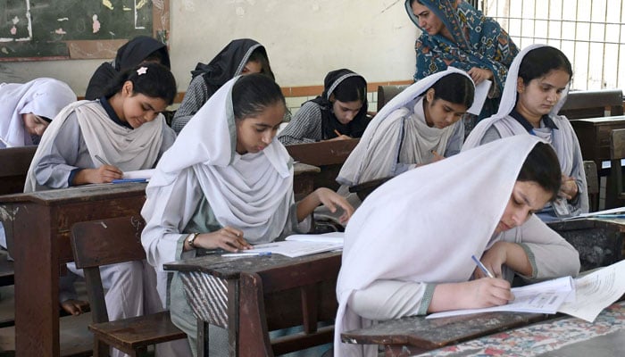 Students busy in solving their questioner during annual matriculation (9th and 10th grade) examinations under the Board of Secondary Education Karachi, in Karachi, on on April 10, 2026. —  ONLINE