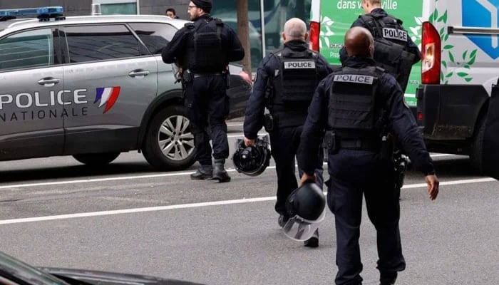 French police officers leave a metro station after a crime in Paris. — AFP/File