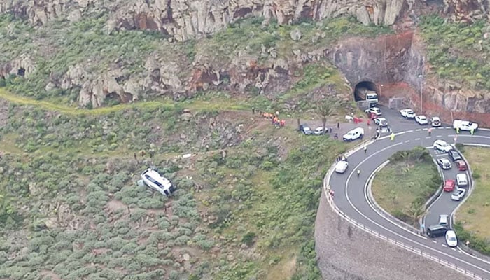 An aerial view shows the crash site of a tourist bus that veered off the road, killing at least one person and injuring 14 others, in San Sebastian de La Gomera, in Spains Canary Islands, April 10, 2026. — Reuters