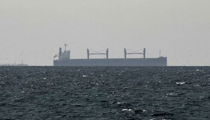 A cargo ship in the Gulf, near the Strait of Hormuz, as seen from northern Ras al-Khaimah, near the border with Oman’s Musandam governance, amid the US-Israeli conflict with Iran, in United Arab Emirates, March 11, 2026. — Reuters