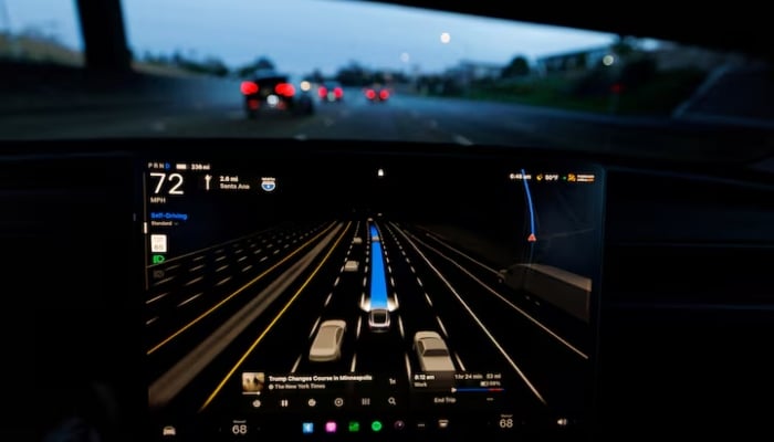 A Tesla Model 3 is shown driving on the highway with FSD 14.2.2.3 self-driving supervised software in Irvine, California, US, January 28, 2026.—Reuters