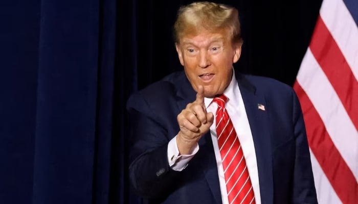 US President Donald Trump gestures to supporters during a campaign rally at the Forum River Center in Rome, Georgia, on March 9, 2024.— Reuters