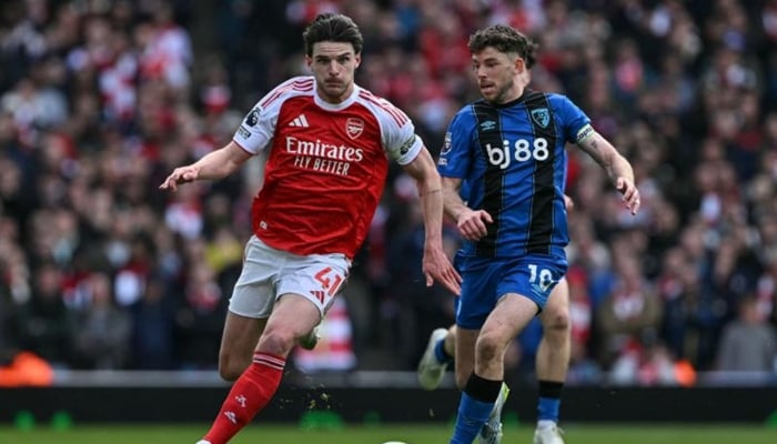 Bournemouths Scottish midfielder Ryan Christie (right) challenges Arsenals English midfielder Declan Rice (left) during the English Premier League football match between Arsenal and Bournemouth. —AFP