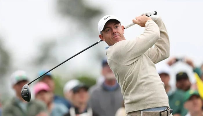 Defending champion and world number two Rory McIlroy of Northern Ireland plays a tee shot during a practice round for the 90th Masters at firm and fast Augusta National. —AFP/File