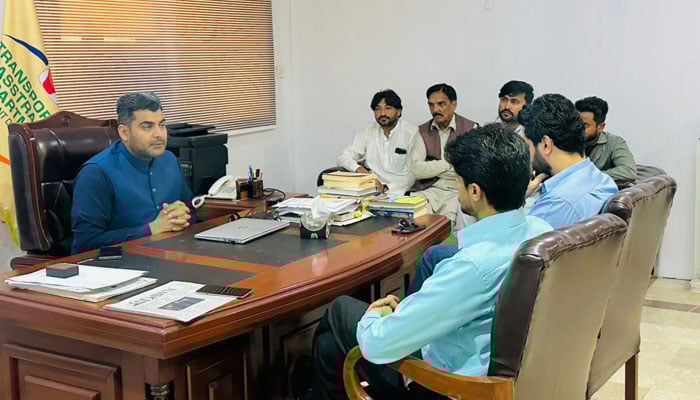 Secretary Regional Transport Authority (RTA) Rawalpindi, Asad Shirazi, chairs a meeting with transporters on April 11, 2026. — Facebook@RWPDRTA