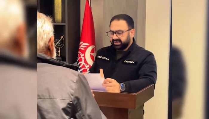 DIG Investigation Syed Zeeshan Raza hears a citizens complaint during an open court at the DIG Investigation Lahore office on February 9, 2026. — Screengrab via Facebook@InvestigationPoliceLahore