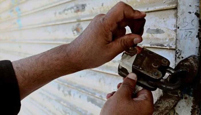 A representational image of a building being sealed by authorities. — APP/File