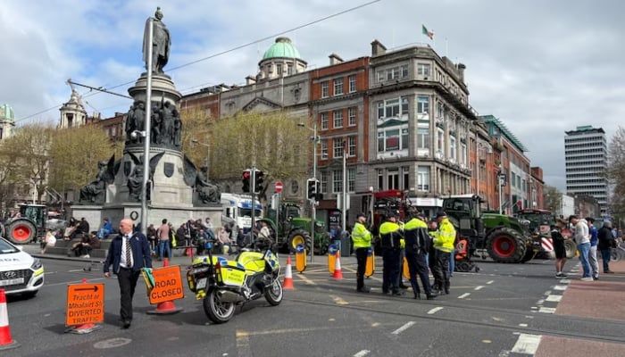 Police officers stand in the street, as tractors block Dublins OConnell Street, as part of a protest over the high cost of fuel that clogged up busy thoroughfares and motorways across Ireland for a second successive day, in Dublin, Ireland April 8, 2026.—Reuters