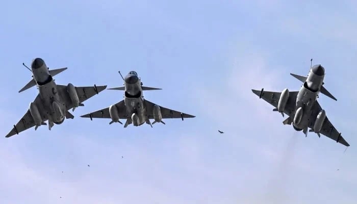 Pakistan Air Force J-10 fighter jets fly past during the national day parade in Islamabad on March 23, 2025. — AFP