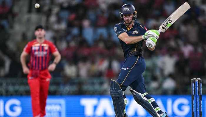 Gujarat Titans’ English cricket player Jos Buttler plays a shot during the 2026 Indian Premier League (IPL) T20 match between Lucknow Super Giants and Gujarat Titans at the Ekana Cricket Stadium in Lucknow on April 12, 2026. — AFP
