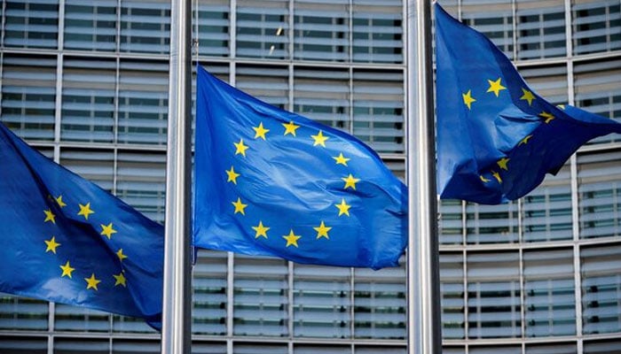 European Union flags fly outside the European Commission headquarters in Brussels, Belgium, March 1, 2023. — Reuters