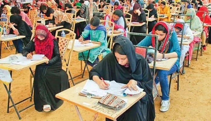Students can be seen attempting their examination. — INP/Files