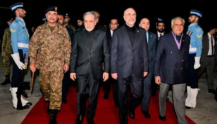 Deputy Prime Minister and Foreign Minister Senator Mohammad Ishaq Dar (right) and Chief of Defence Forces and Chief of Army Staff Field Marshal Syed Asim Munir (left) receive the Iranian delegation, including Iranian Parliament Speaker Mohammad Bagher Ghalibaf (centre-right) and Foreign Minister Abbas Araghchi (centre-left), Islamabad, April 11, 2026. — Reuters