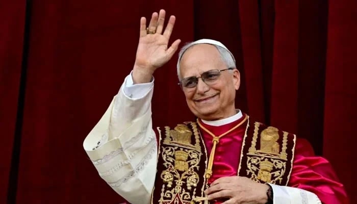 Newly elected Pope Leo XIV, Robert Prevost addresses the crowd from the main central loggia balcony of the St Peters Basilica for the first time, after the cardinals ended the conclave, in The Vatican, on May 8, 2025 — AFP