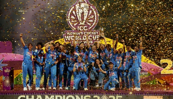 India players celebrate with the trophy after winning the ICC Womens World Cup. —Reuters