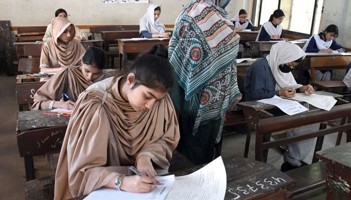Students busy in solving their question papers during annual matriculation examinations under the Board of Secondary Education, Karachi, April 10, 2026. — Online
