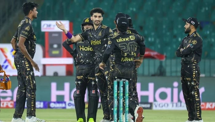 Peshawar Zalmis Sufiyan Muqeem (centre) celebrates with teammates after claiming a wicket during the PSL 11 match against Multan Sultans at the National Bank Stadium in Karachi on April 13, 2026. — PSL