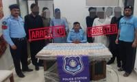 8 Held In Crackdown On Gambling Den