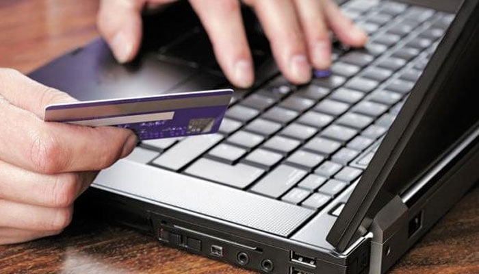 A representational image of a person doing online shopping.— Reuters/File