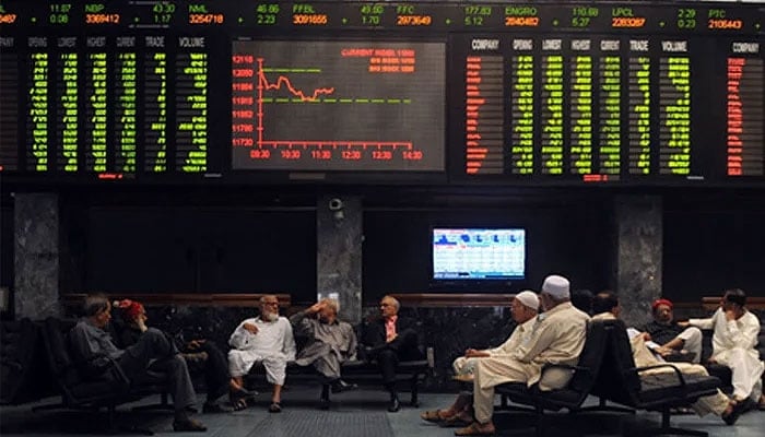 Investors are sitting in the hall of the Pakistan Stock Exchange in Karachi. — AFP/File