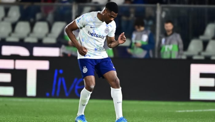 Denzel Dumfries celebrates scoring his second, and Inter Milans fourth, at Como. — AFP/File
