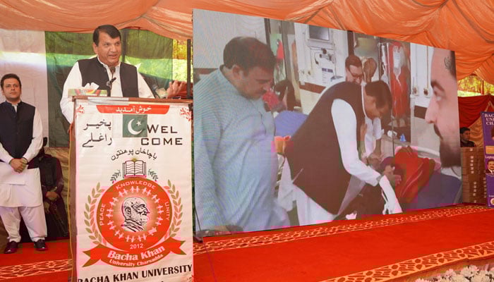 Federal Minister for Kashmir Affairs, Gilgit-Baltistan, States and Frontier Regions Amir Muqam addressing an event at the Bacha Khan University, Charsadda, (BKUC) on April 14, 2026. — Facebook@AmirMuqamAM