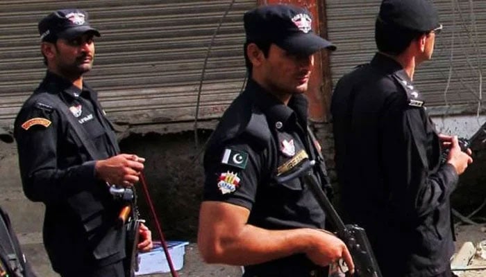Officials of the Counter-Terrorism Department (CTD) can be seen taking part in an operation in an area. — AFP/File