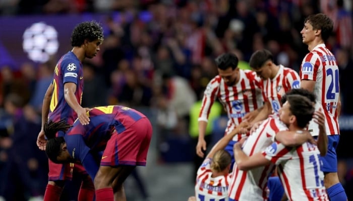 Atletico Madrid celebrating after the match. —AFP/File