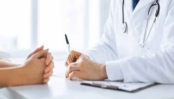 The representational image shows a consultation between a healthcare professional and a patient. — Unsplash/File