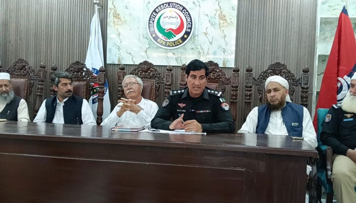 The image shows a workshop of the Dispute Resolution Councils (DRCs) Pashtakhra panel in Peshawar on April 13, 2026. — Facebook@pakhtunkhwapolice