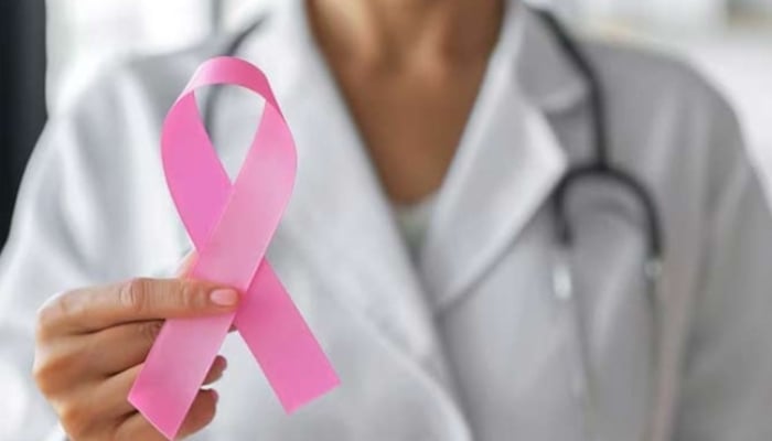 Representational image of a doctor holding pink ribbon. —Freepik/File