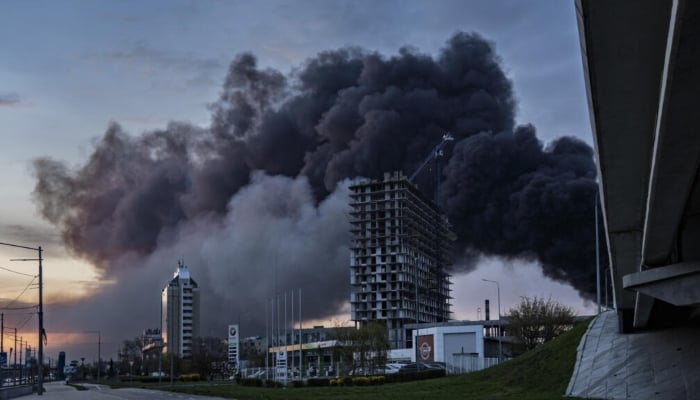 Black smoke can be seen over Kyiv after Russian drones and missiles attack. —AFP/File