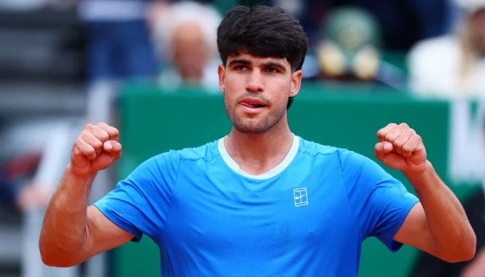 Spains Carlos Alcaraz celebrates winning his round of 32 match against Argentinas Sebastian Baez at Monte Carlo Country Club in Roquebrune-Cap-Martin on April 7, 2026. — Reuters