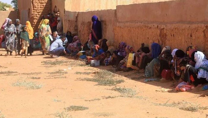 Displaced people from the towns of Bara and Umm Dam Haj Ahmed in North Kordofan State take shelter in Omdurman, part of greater Khartoum, on November 10, 2025. —AFP