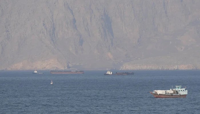 Ships and tankers in the Strait of Hormuz off the coast of Musandam, Oman, April 18, 2026. — Reuters