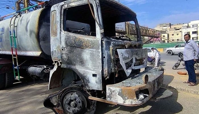 A torched dumper truck after a traffic accident in Karachi on February 18, 2025. — PPI