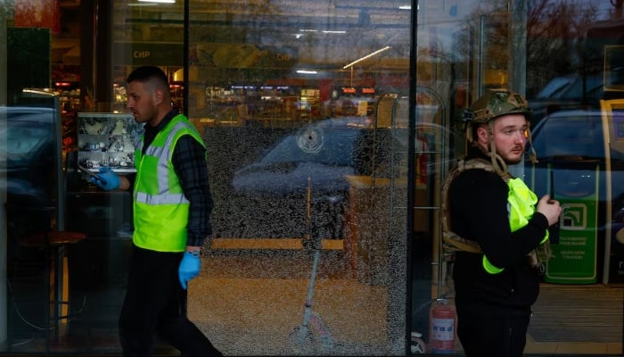 A bullet hole in the glass of a supermarket, where Ukrainian police killed a man who opened fire in a city district and barricaded himself into the supermarket on Saturday, Ukrainian Interior Minister Ihor Klymenko said, in Kyiv, Ukraine, April 18, 2026.—Reuters