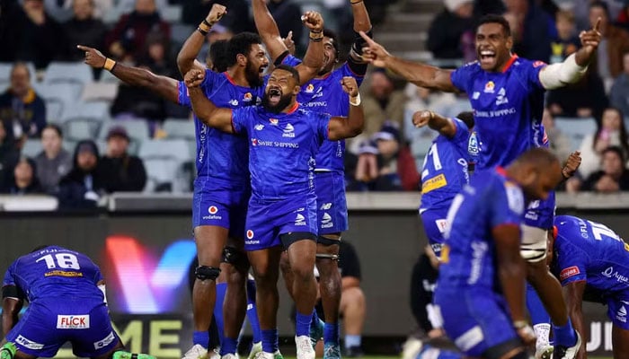Fijian Drua players celebrate their maiden victory on Australian soil. — AFP