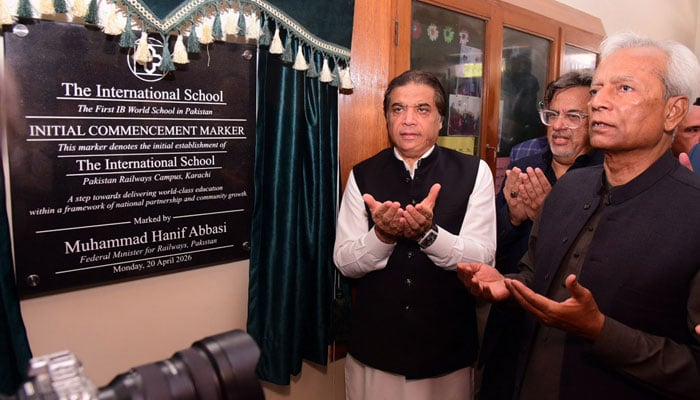 Federal Minister for Railways Muhammad Hanif Abbasi and Sindh Governor Sindh Nehal Hashmi offer dua after unveiling the inaugural plaque of The International School Pakistan Railway Campus, Karachi, on April 20, 2026. — APP/File