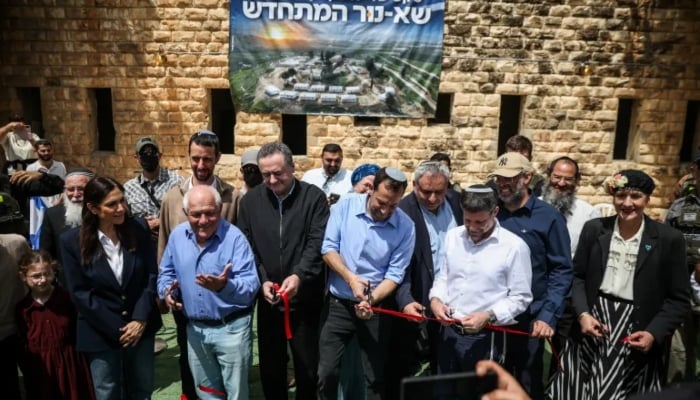 Israeli Defence Minister Israel Katz and Finance Minister Bezalel Smotrich attend a celebration for the re-establishment of the settlement of Sa-Nur on April 19, 2026. —Reuters
