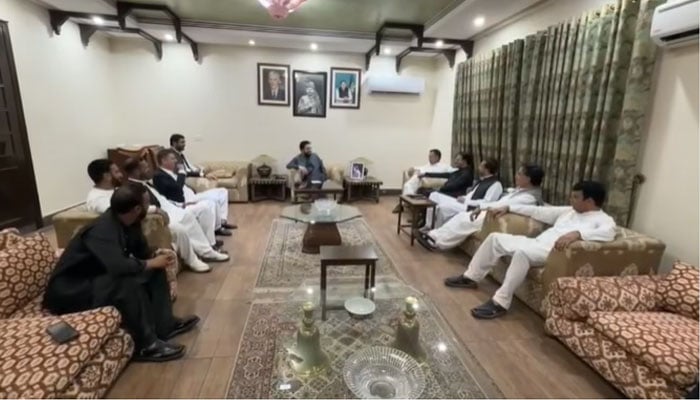 Khyber Pakhtunkhwa Chief Minister Muhammad Sohail Afridi meeting with a delegation of Pakistan Tehreek-e-Insaf leadership from Azad Jammu and Kashmir on April 21, 2026. — Facebook@ImMuhammadSohailAfridi/Screengrab