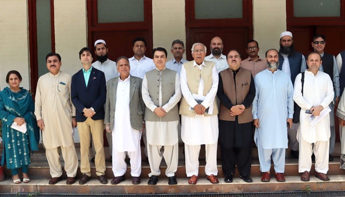 The image shows a group photo after the first Orientation Session at The University of Engineering and Technology Peshawar on April 21, 2026. — Facebook@UETPeshawarOfficial