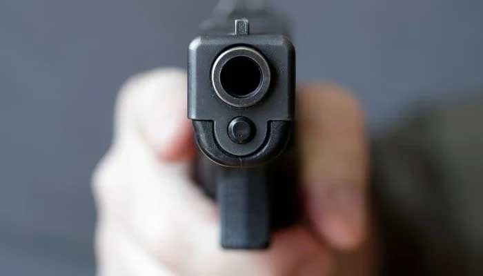 The representational image shows a man holding a gun. — Reuters/File