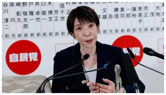 Japans Prime Minister Sanae Takaichi speaks to the media in front of a board displaying the names of LDP candidates at the LDP headquarters on general election day in Tokyo, Japan, February 8, 2026.— Reuters
