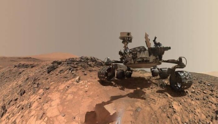 This NASA photo released June 7, 2018 shows a low-angle self-portrait of NASAs Curiosity Mars rover vehicle at the site from which it reached down to drill into a rock target called Buckskin on lower Mount Sharp. —AFP